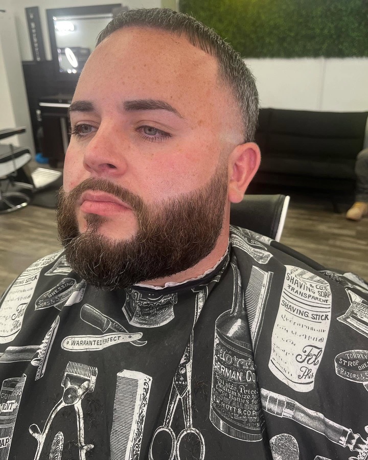 Full beard and mid fade, front view, La Barberia