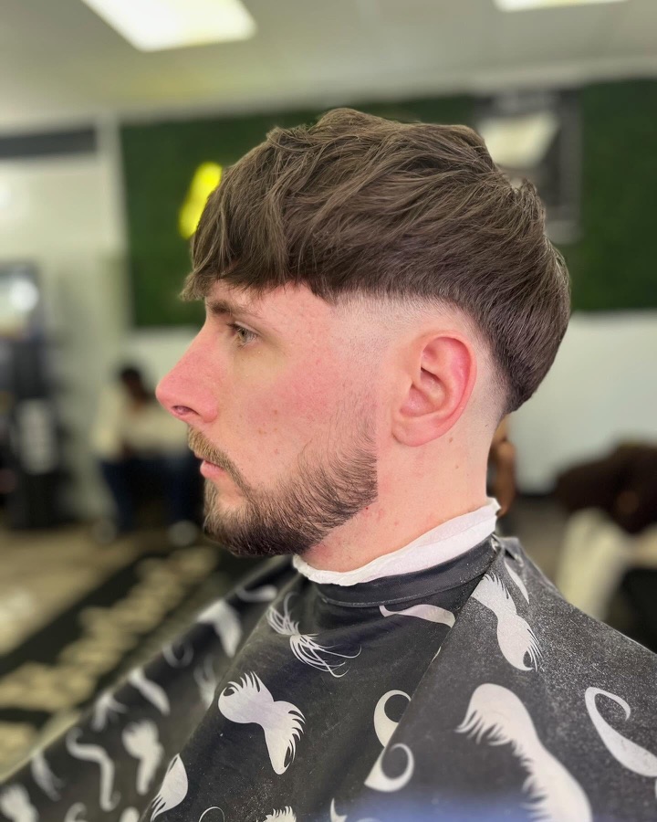 Textured soft-mullet crop with a low fade, La Barberia