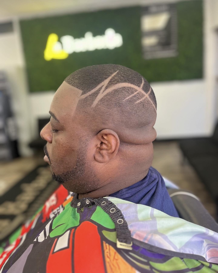 Heart hair design shaved into the back of a fade, La Barberia
