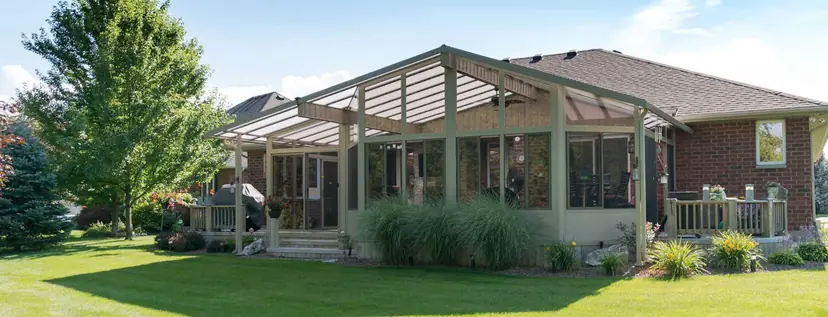 Sunspace Model 300 gable sunroom beside a lake