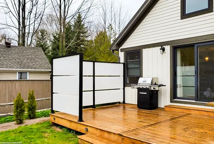 Sunspace Sunwall privacy wall on a deck beside the grill. Sunspace Sunwall privacy wall on a deck