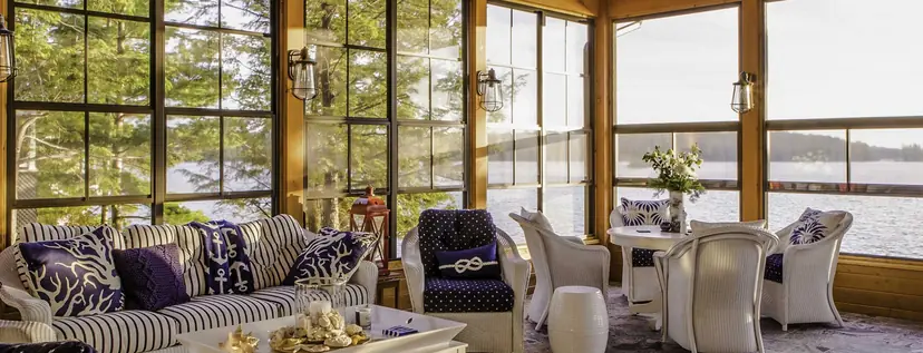 Sunspace porch conversion interior with a cedar ceiling and a wall of WeatherMaster windows